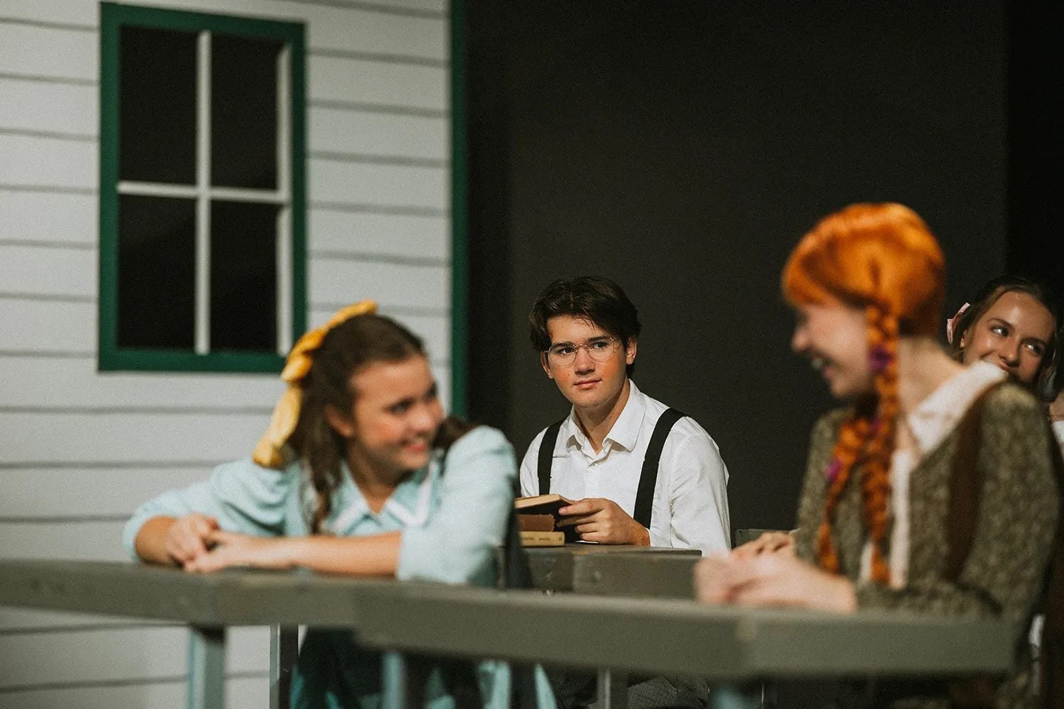 Students in a schoolroom scene from Anne of Green Gables at Shadow Mountain Event Center
