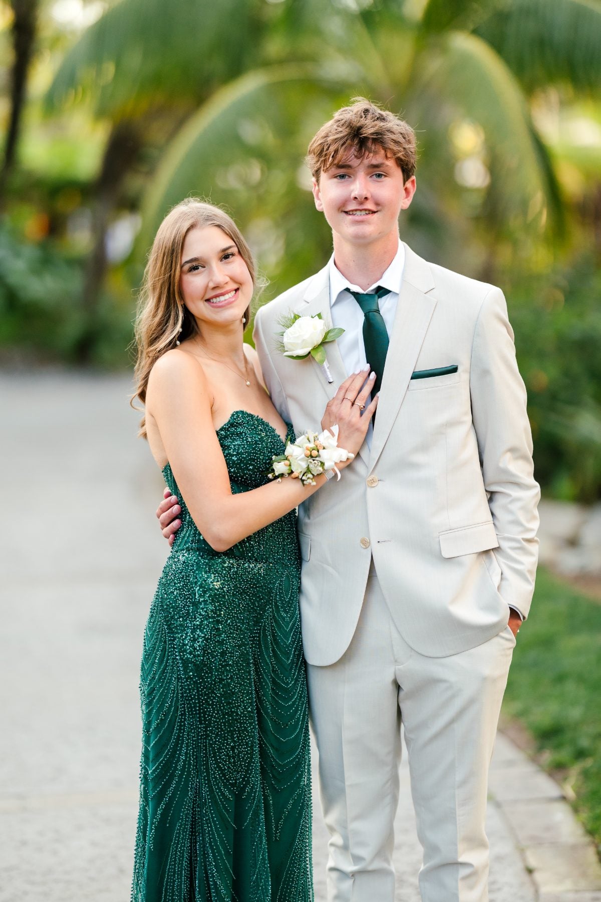 Two Christian High School students pose in formal wear at Catamaran Resort