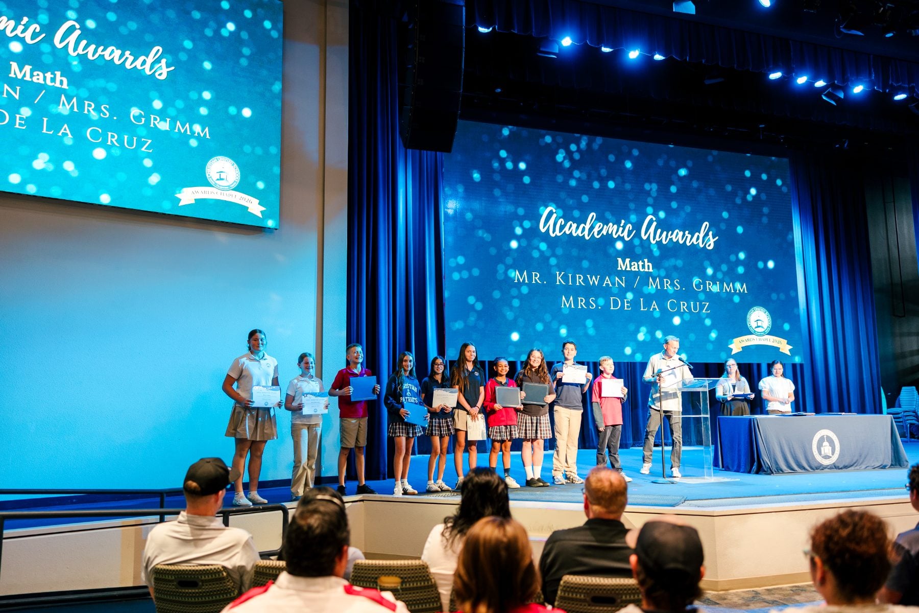 Junior high students line up for Math Academic Awards at the awards chapel