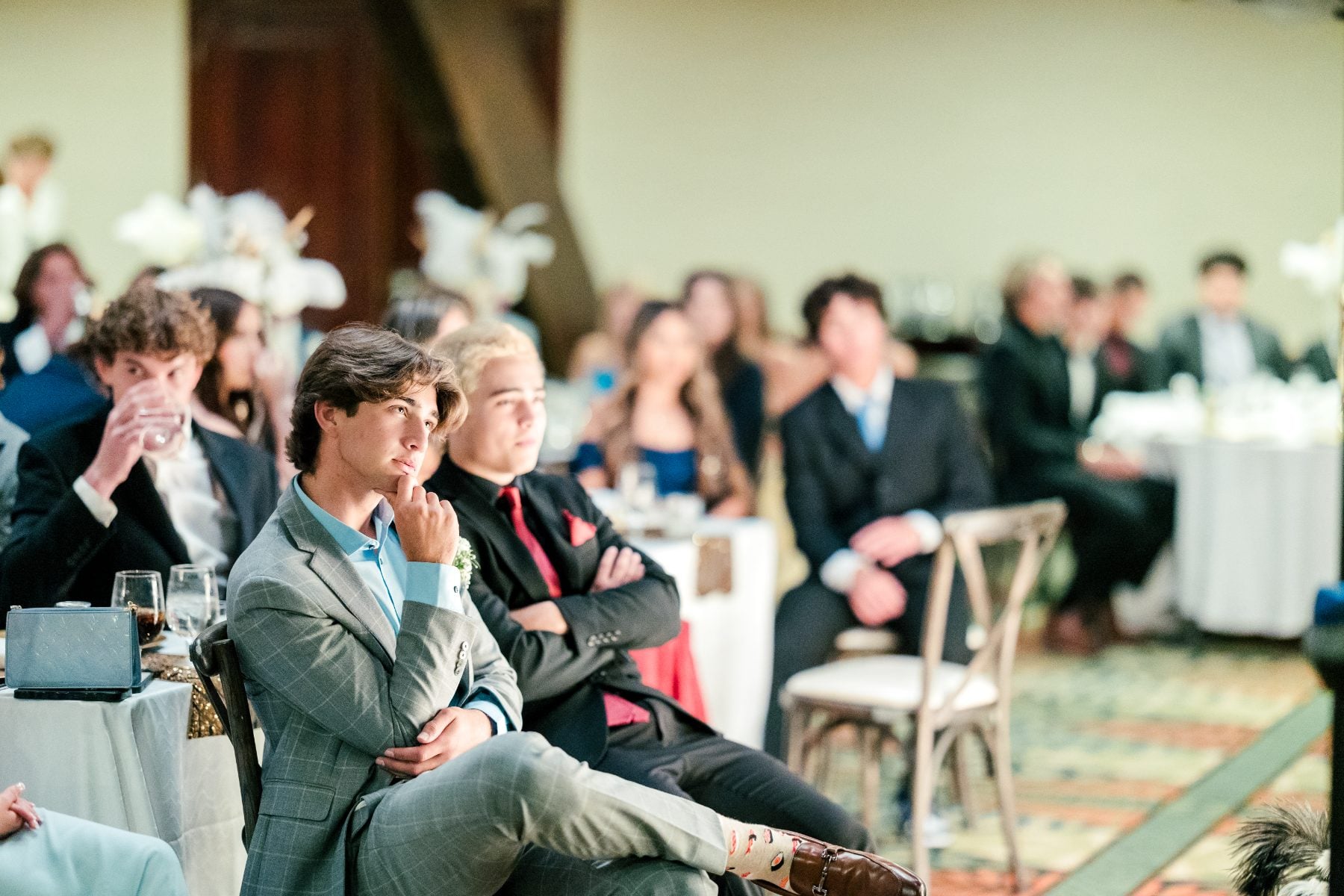 Students listen attentively during the program at Catamaran Resort banquet