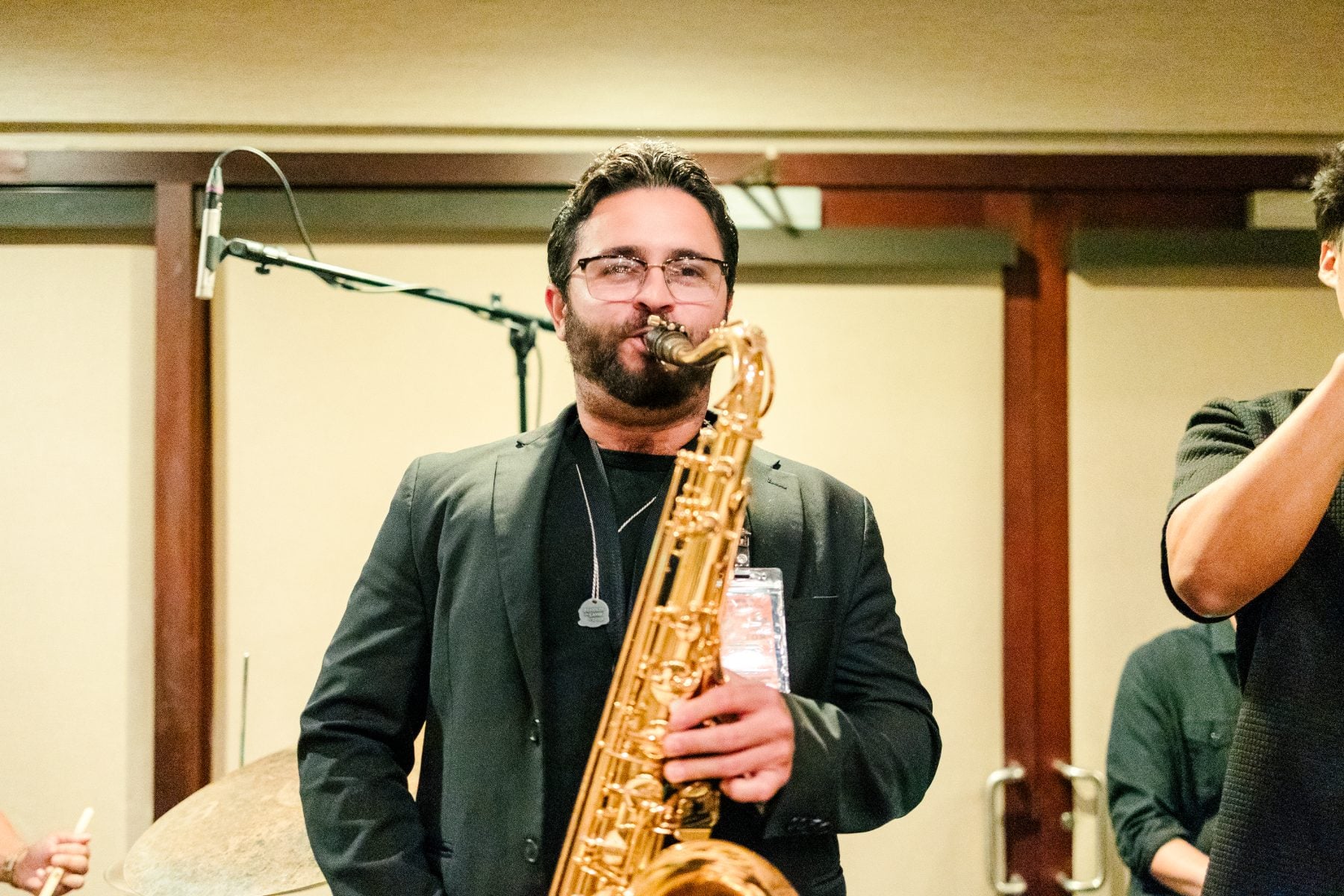 A musician plays saxophone during live jazz at the Catamaran Resort event