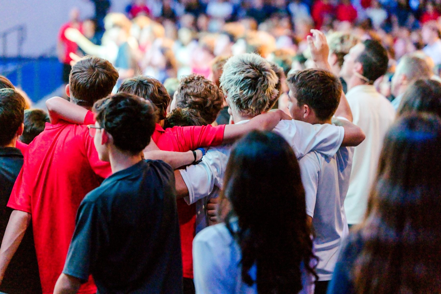 Students stand arm-in-arm during Walk Worthy Chapel Kick-off at Event Center