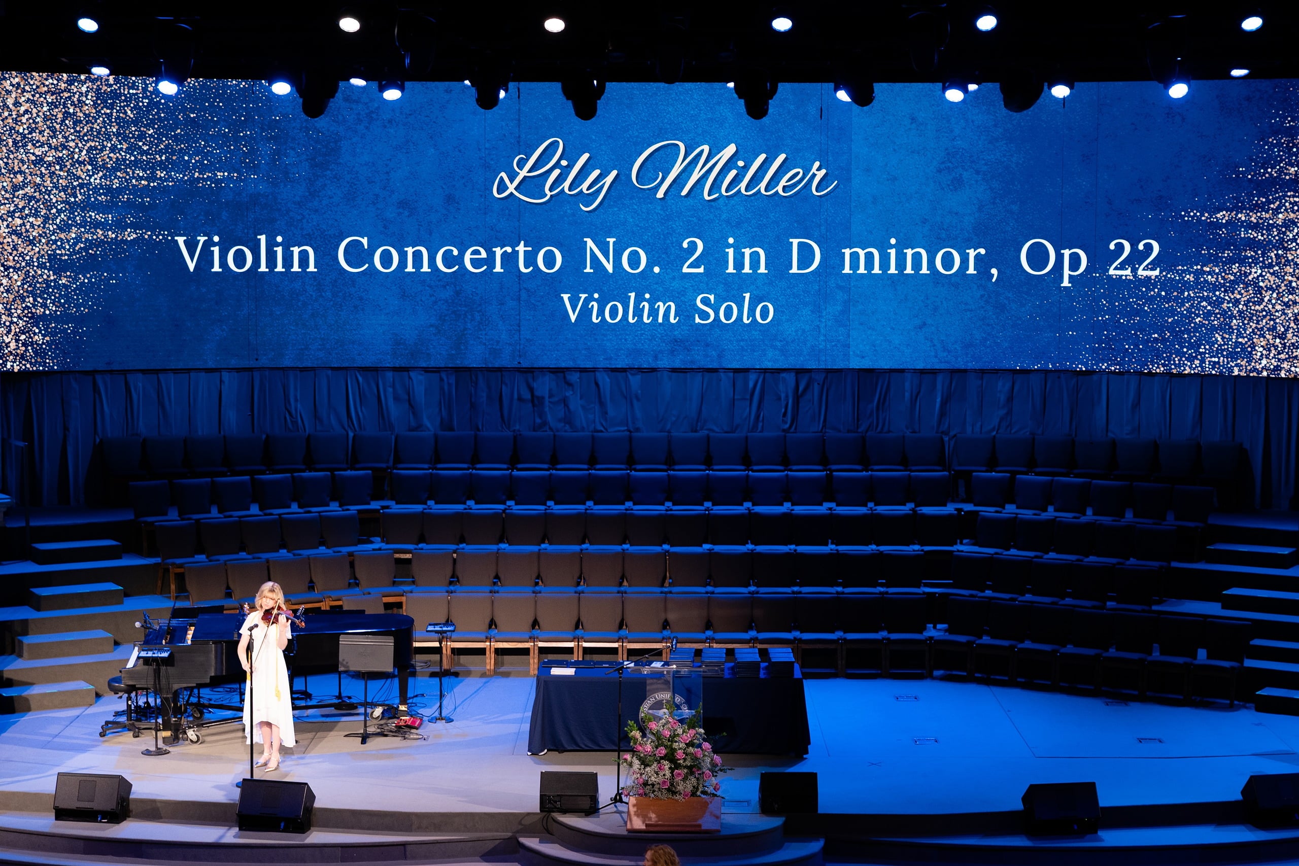 Christian High School Commencement 2025: Rise Up — 12 Teen soloist in white dress performs violin concerto on the auditorium stage