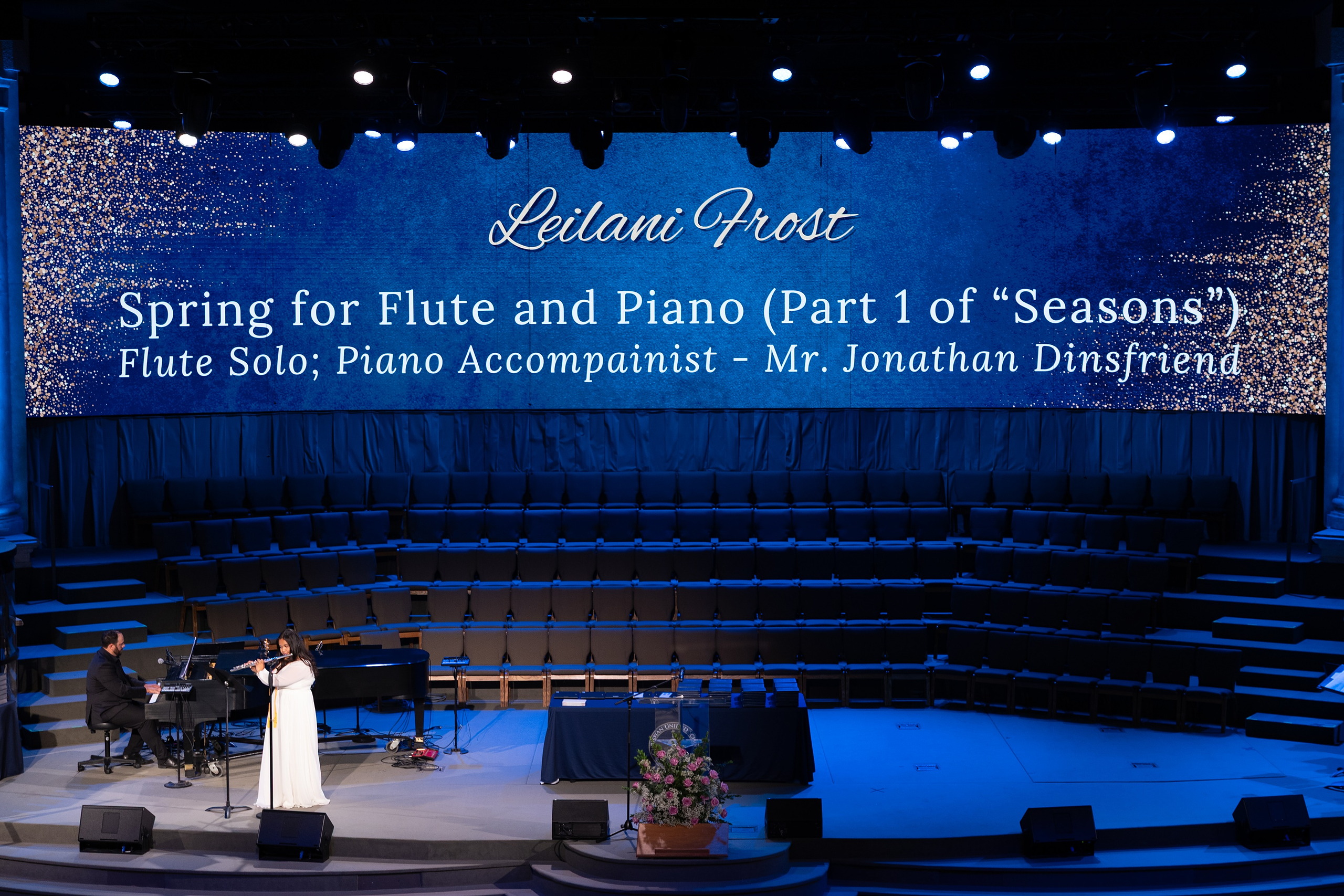 Christian High School Commencement 2025: Rise Up — 14 Graduate performs a flute solo with piano accompaniment on the stage
