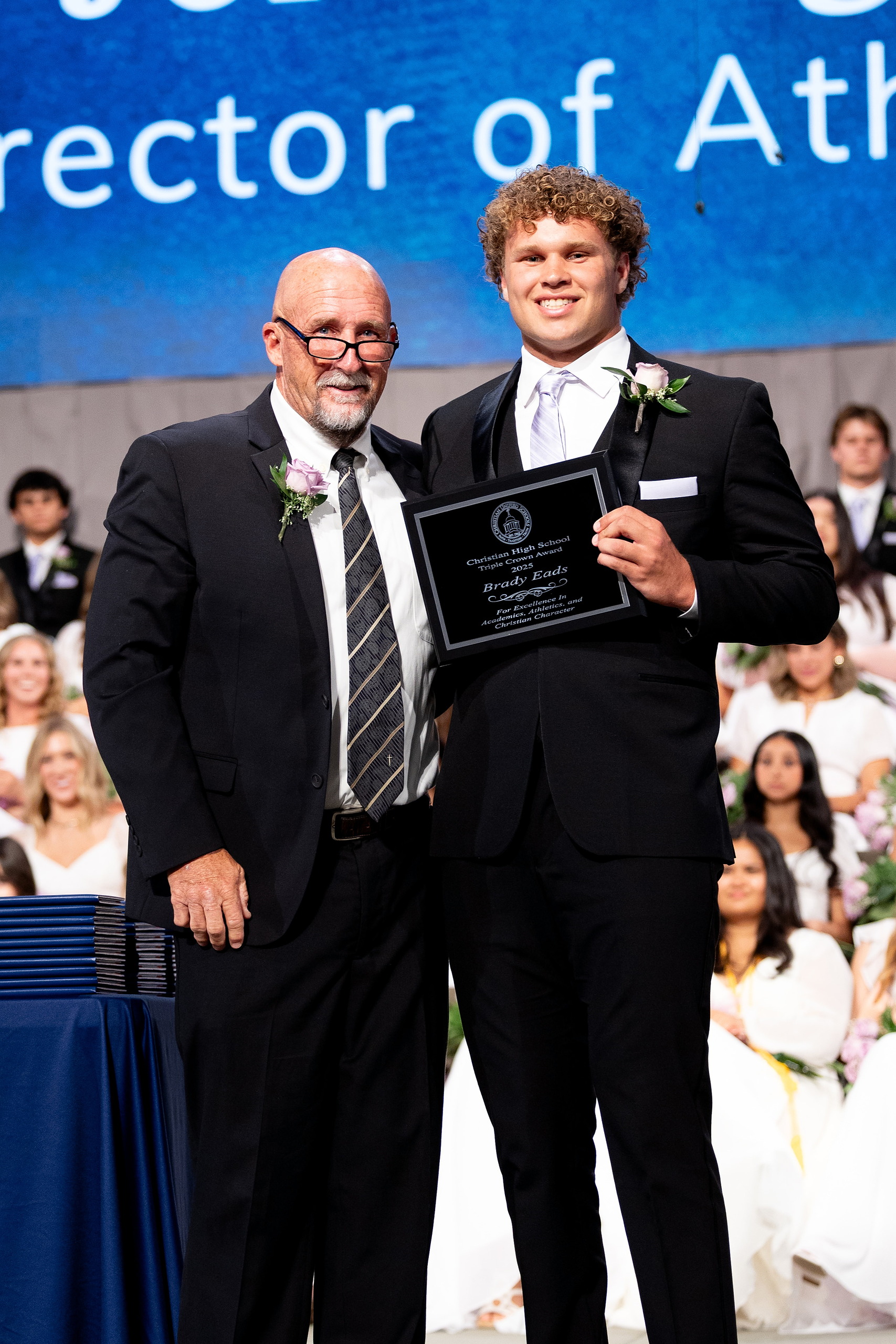 Christian High School Commencement 2025: Rise Up — 31 Male graduate accepts a prestigious scholarship award at the ceremony