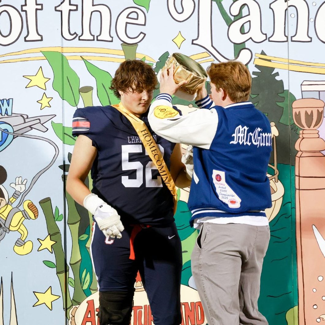 Homecoming king crowned during Christian High School Patriots football halftime ceremony