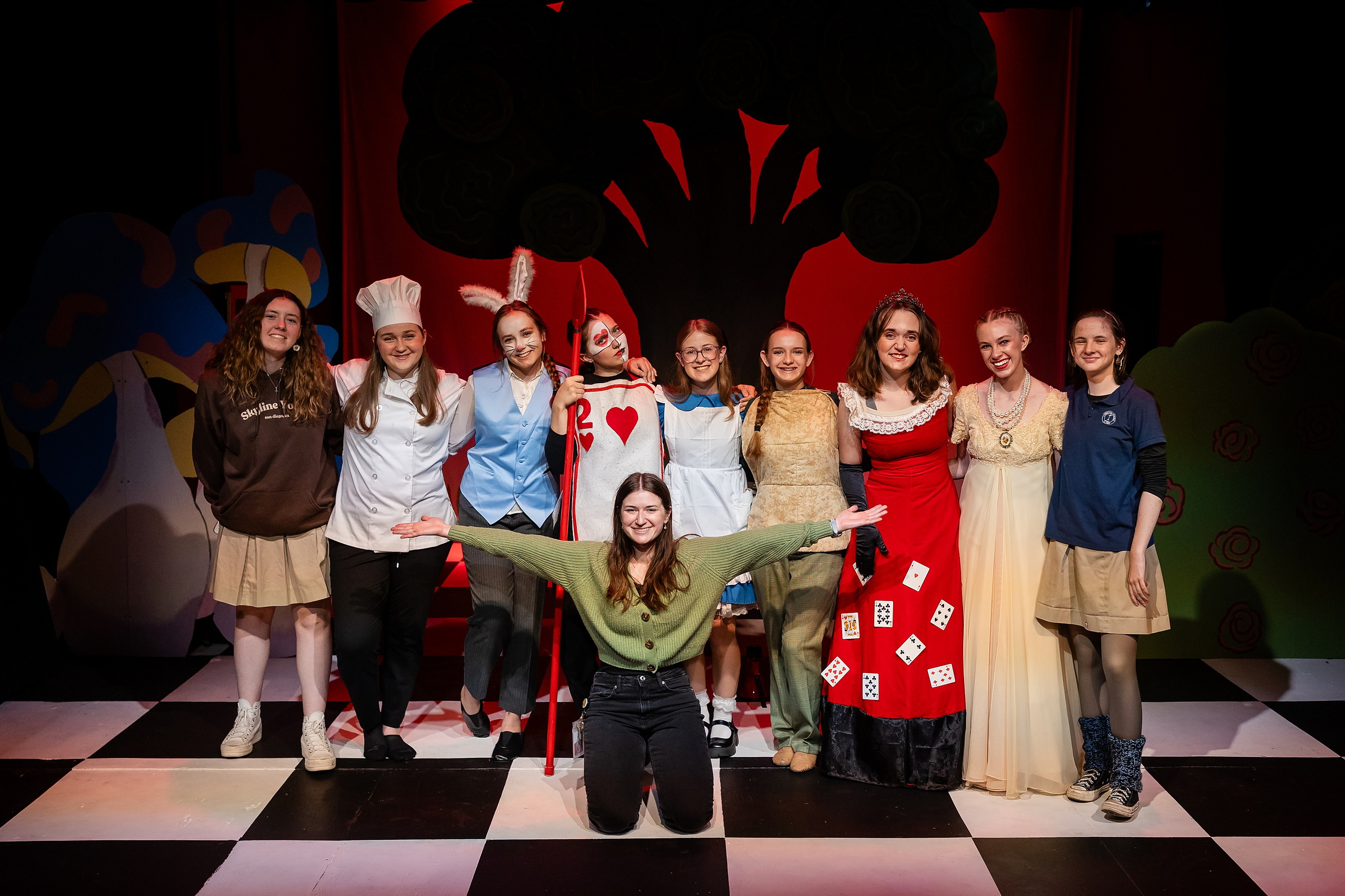 Curiouser and Curiouser! A Whimsical Journey with the Patriot Players — 22 Full cast of students performs Alice in Wonderland finale together