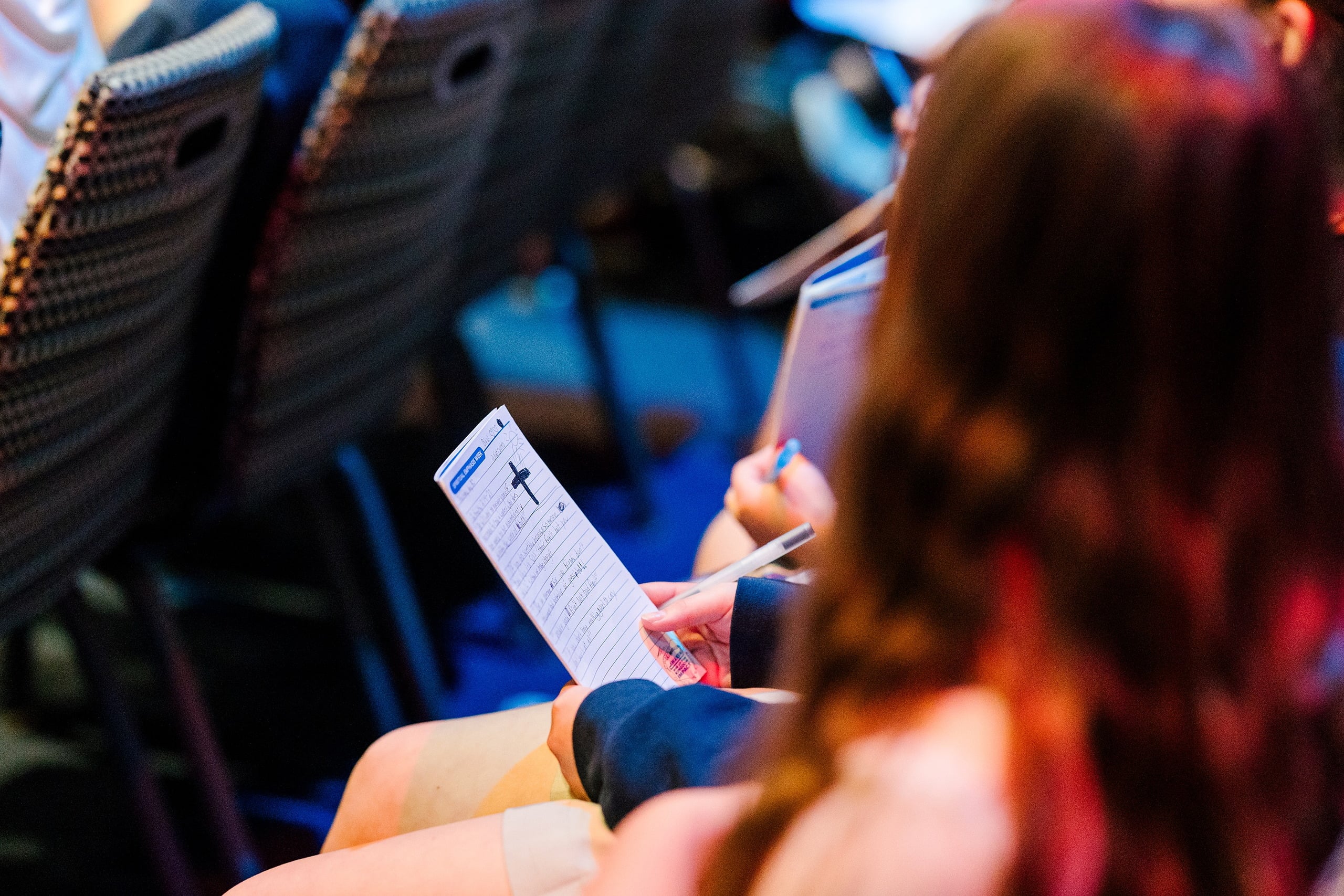 Spiritual Emphasis Week 2025 — 15 Students in chapel taking notes and participating in worship together