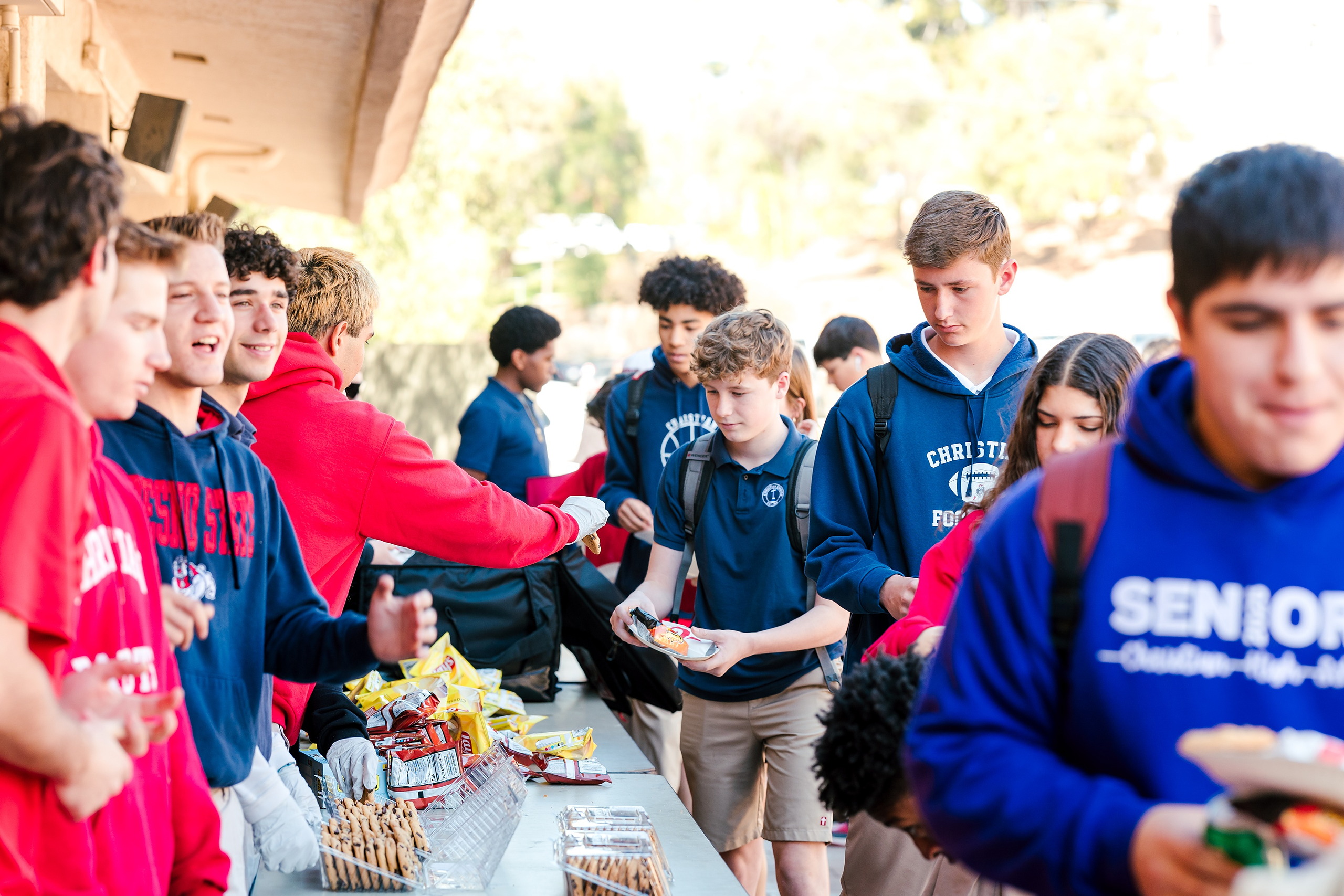 Spiritual Emphasis Week 2025 — 16 Students gather at missions lunch serving line with snacks and food