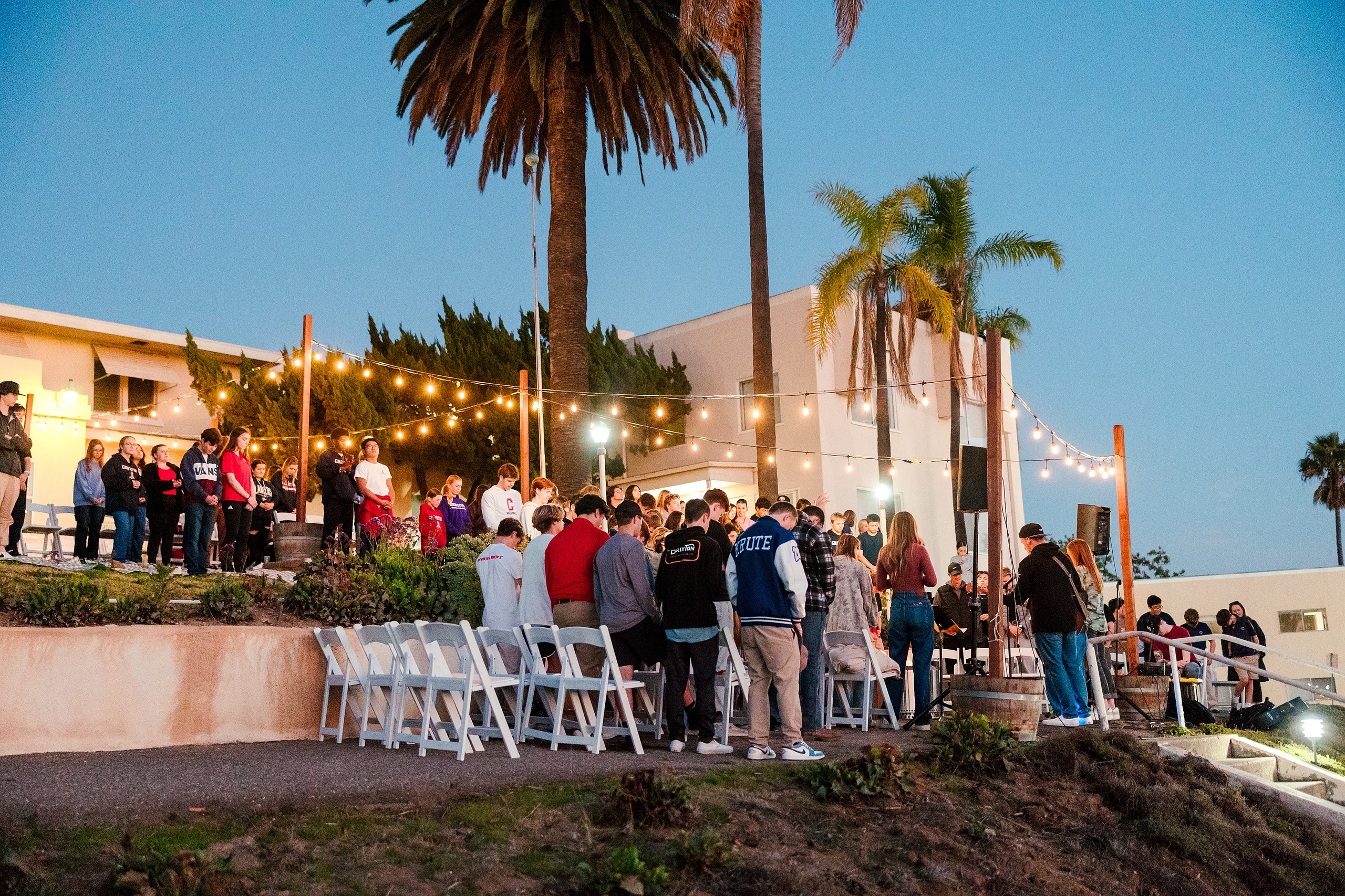 Spiritual Emphasis Week 2025 — 41 Students assemble outdoors at Seminary venue with seating and stage setup