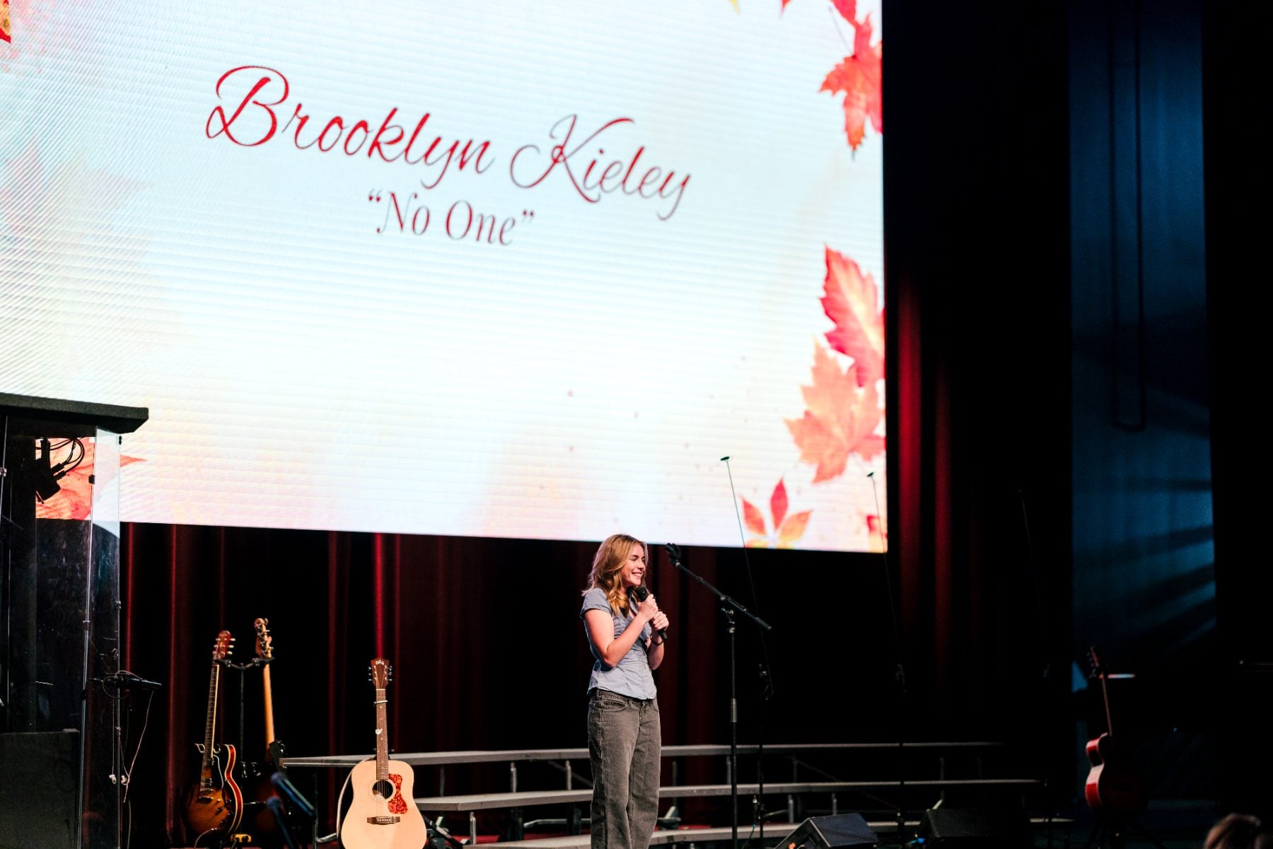 A student performs solo "No One" at the Fall Choral Concert.